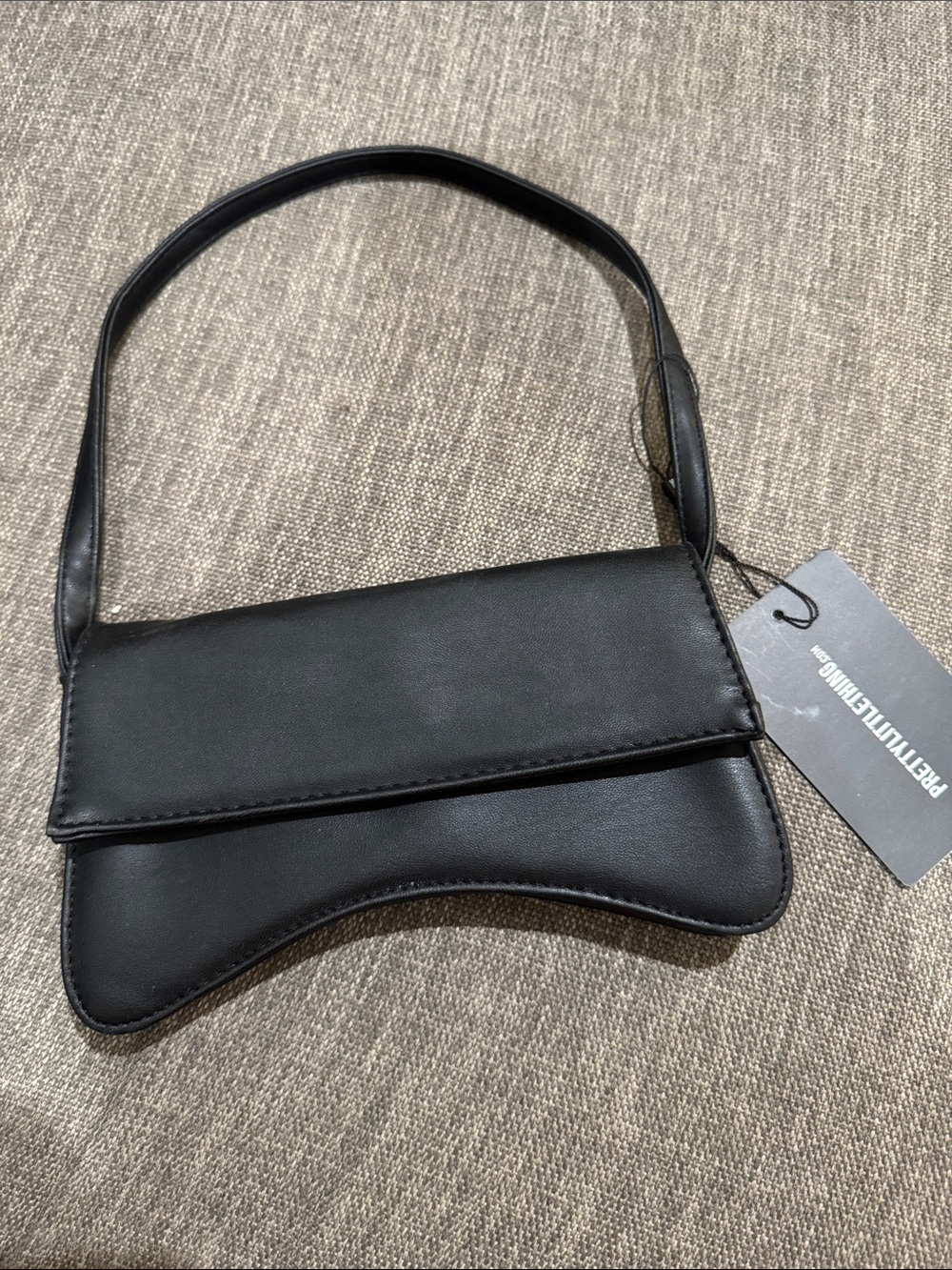 PrettyLittleThing Black Curved Mini Shoulder Bag